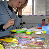 Tracy Skibitzki at work in the art studio